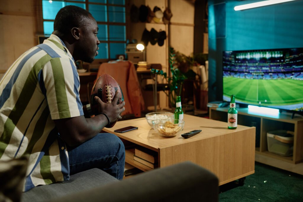 Black Football Fan Watching Match